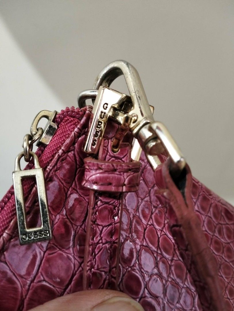 Guess Wristlet Pouch (Category: Purses & Pouches) located in Baguio. Submitted by bagnpouchbuddies (Listing ID 1470908125, Image 2). Description: Location: Baguio MoP: Gcash MoD: JnT Brand: Guess Size: 8L x 4H Inches Condition: Lightly used, No flaws Description: Wristlet with zipper. Actual photos. Pls. check all photos before buying.