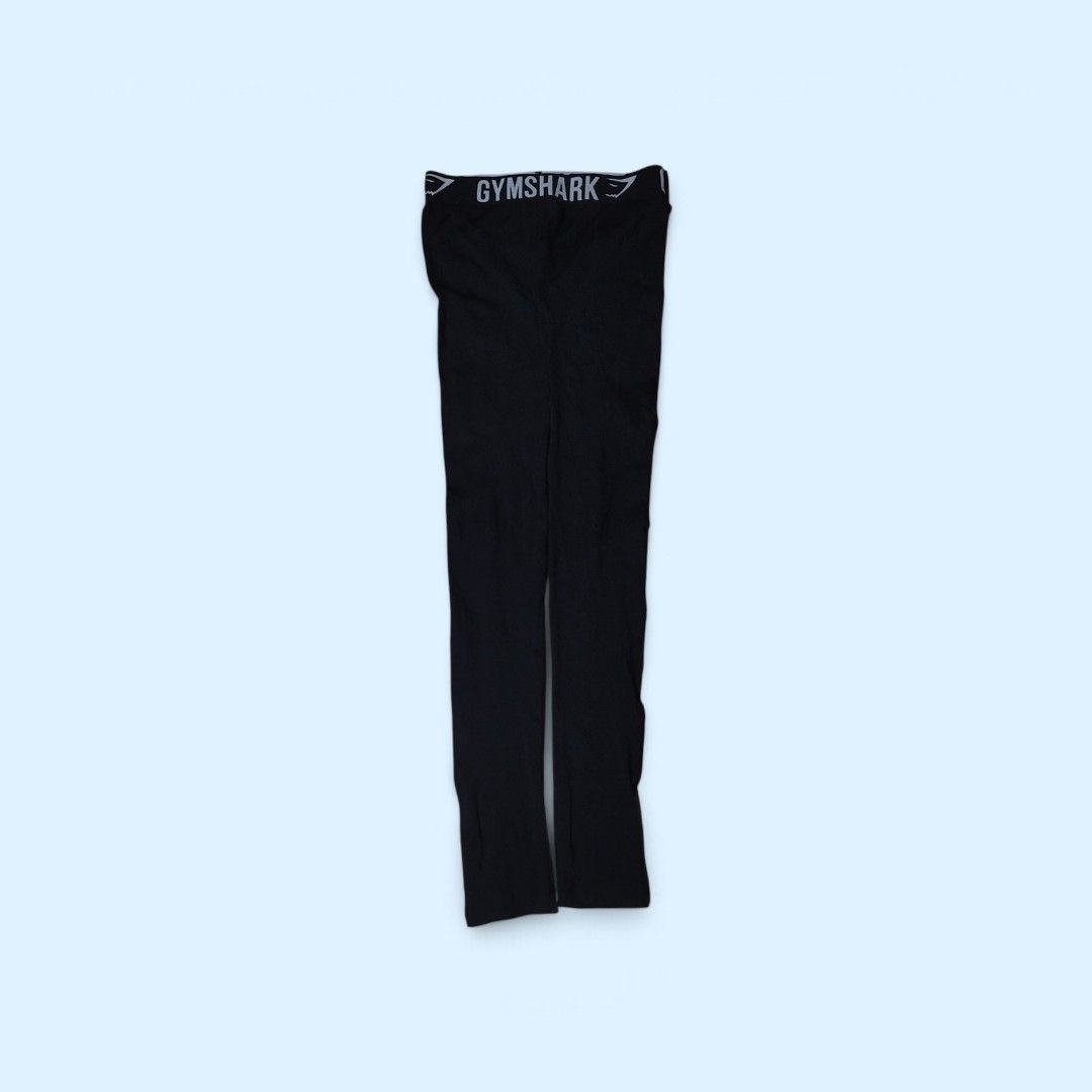Gymshark Black Leggings (Category: Activewear) located in Tayabas. Submitted by jthriftshop. (Listing ID 1470858931, Image 1). Description: - Brand: Gymshark - Color: Classic black, easy to match with any sports top or hoodie - Length: Full length tights - Waistband: Elastic waistband featuring the Gymshark logo all around - Fabric: Stretchable, holds shape well, and comfortable for workouts or casual wear - Condition: Inside care tag attached at