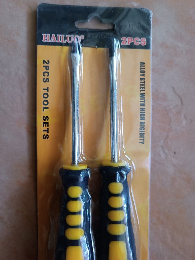 Hailuo 2pcs Screwdriver Tool Set PH2 SL6.0 x 100mm (Category: Construction Tools & Equipment) located in Las Pinas. Submitted by mitchmiko16 (Listing ID 1470755546, Image 2). Description: - Brand: Hailuo - Set includes: 1x PH2 x 100mm Phillips screwdriver and 1x SL6.0 x 100mm slotted screwdriver - Material: High-rigidity alloy steel shafts for durability - Handle: Yellow and black non-slip plastic with ergonomic grip - Condition: Brand new in uno