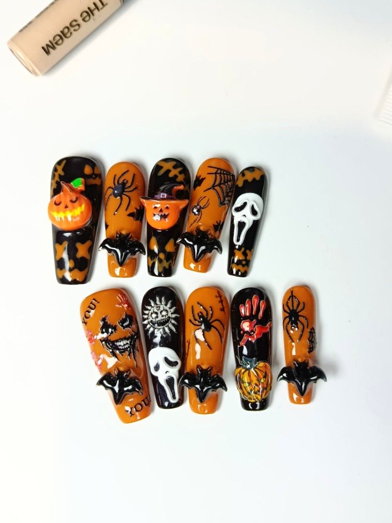 Halloween Press-On Nails Fake Nail Set (Category: Hands & Nails) located in Manila. Submitted by thebossbabe (Listing ID 1470923642, Image 2). Description: - Handmade Halloween press-on nails - Features cute ghosts, pumpkins, bats, spiders, and scream masks - Intricate hand-painted details with 3D charms - High-gloss finish - Ideal for costume parties or daily October wear - with nail set (glue, sticky tab, alcohol pad) .