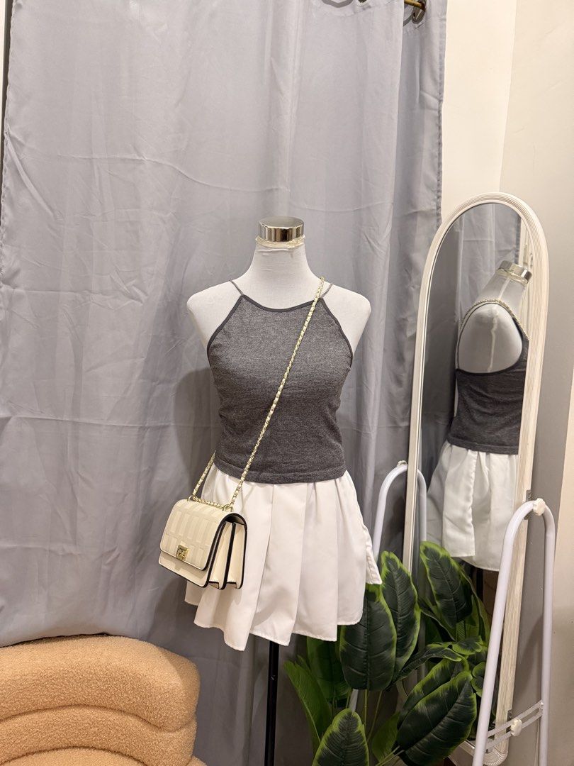 Halter Knitted Top (Category: Sleeveless) located in Quezon City. Submitted by kaye_oineza (Listing ID 1470930932, Image 3). Description: S-M Stretch.