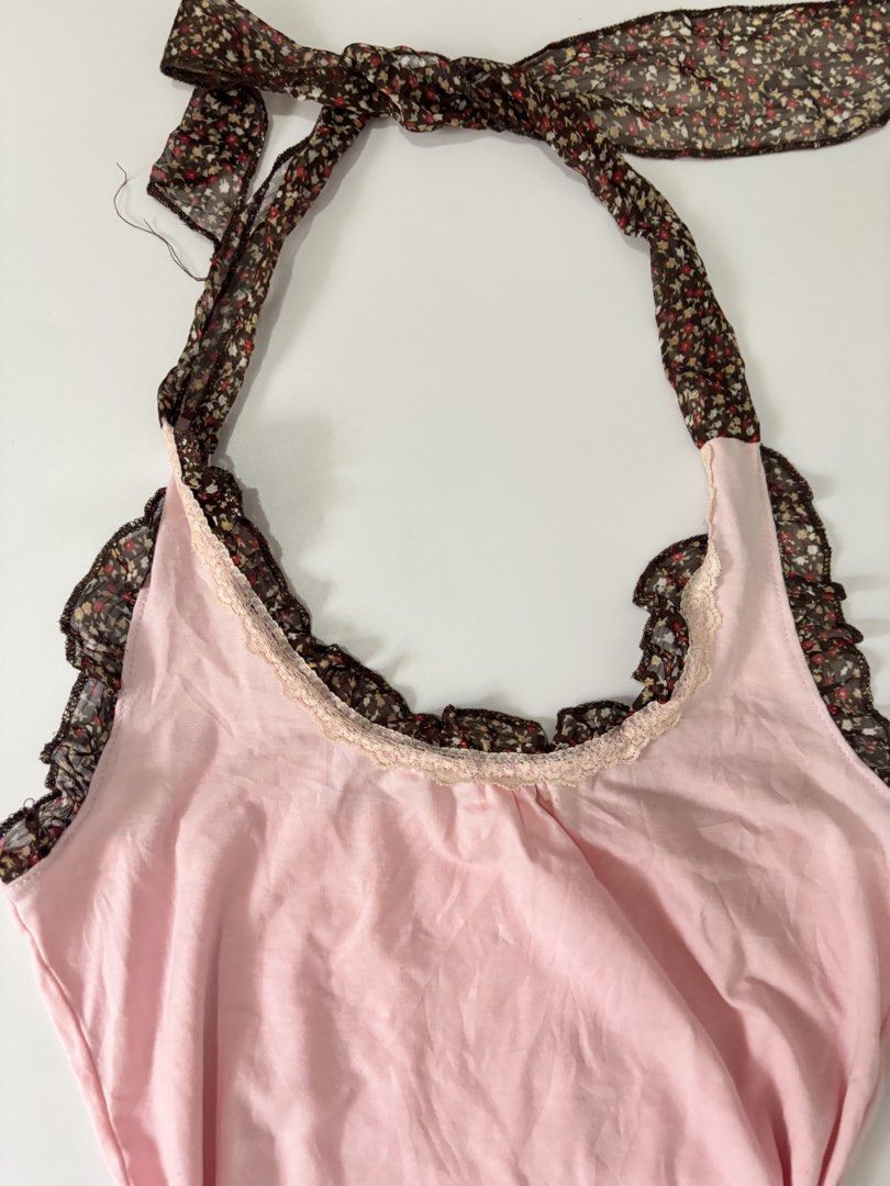 halter top (Category: Sleeveless) located in Binan City. Submitted by byhiraeth (Listing ID 1470779204, Image 2). Description: -small to medium -no ww -see last pic for flaw -will only entertain offers since IM out of reply quota -loc is santa rosa, laguna.