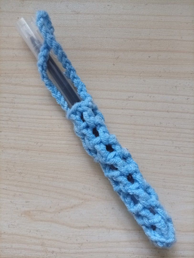 Handmade Pen Holder (Category: Handmade Craft) located in San Mateo. Submitted by feltshop (Listing ID 1470850284, Image 1). Description: - Handmade light blue crochet pen cozy - Fits standard ballpoint pens perfectly - Provides a comfortable, ergonomic grip while writing - Includes the ballpoint pen shown in the photo - Features neat, high-quality stitch work - A cute and cozy addition to any desk setup.
