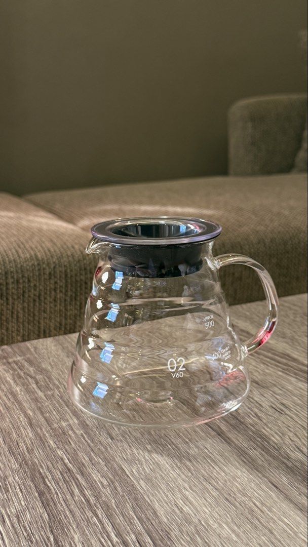 Hario V60 02 Glass Coffee Server (Category: Coffee & Tea Tableware) located in Laoag. Submitted by humaaaan (Listing ID 1470766984, Image 2). Description: - Authentic Hario V60 Size 02 Glass Server, made in Japan - Generous 600ml comfortable brewing capacity - Premium heat-resistant borosilicate glass with clear measurement markings - Includes original black silicone lid, comes with original box - No issues/minor scratches.