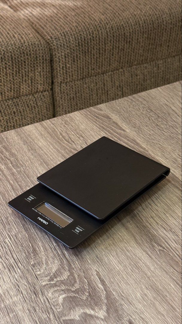 Hario VST-2000 Coffee Drip Scale (Category: Coffee Machines & Makers) located in Laoag. Submitted by humaaaan (Listing ID 1470768509, Image 1). Description: - Model: Hario VST-2000 Digital Scale - Color: Sleek matte black finish - Features: Built-in timer with precise gram measurement - Ideal for: Pour-over coffee brewing - Power: Uses 2 AAA batteries - Condition: Clean and 100% working condition - Comes with original box/Rarely used.