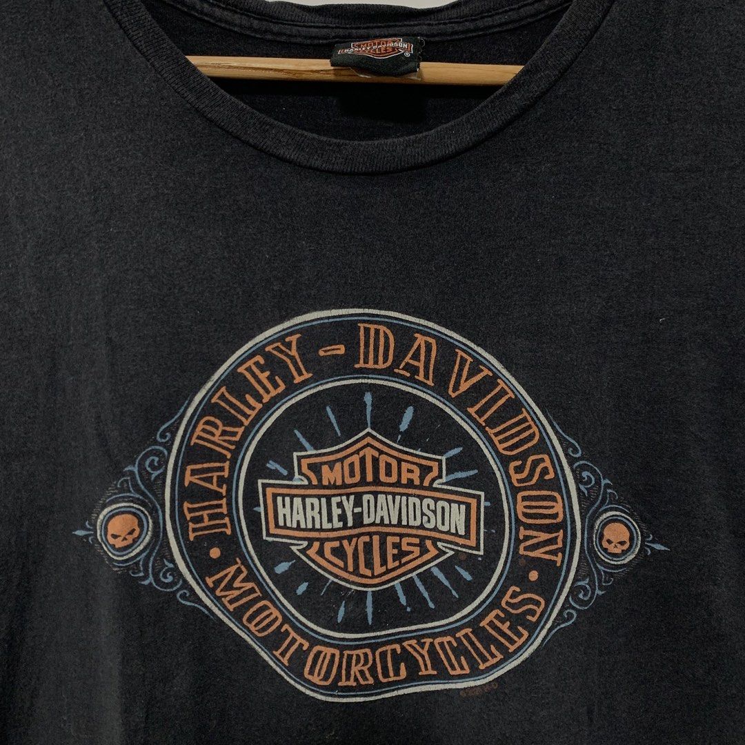 Harley davidson (Category: Tshirts & Polo Shirts ) located in Cavite. Submitted by yobubsss (Listing ID 1470900227, Image 3). Description: - Authentic Harley-Davidson black graphic tee - From Mitchell's Modesto, California dealership - Large circular skull design on the chest - Bold back print with dealership lettering and bar & shield logo - Dated 2020 on the graphics - Classic crew neck and short sleeves - 100% cotton with a stylish washed-in l