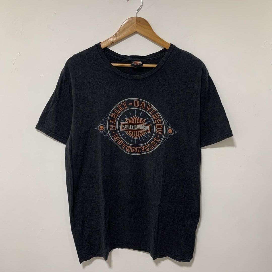 Harley davidson (Category: Tshirts & Polo Shirts ) located in Cavite. Submitted by yobubsss (Listing ID 1470900227, Image 1). Description: - Authentic Harley-Davidson black graphic tee - From Mitchell's Modesto, California dealership - Large circular skull design on the chest - Bold back print with dealership lettering and bar & shield logo - Dated 2020 on the graphics - Classic crew neck and short sleeves - 100% cotton with a stylish washed-in l
