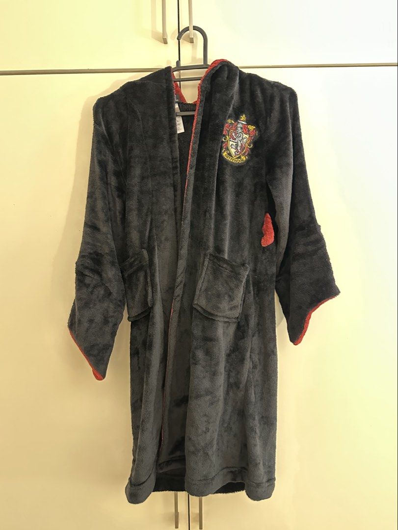 Harry Potter Gryffindor Hooded Robe Size S (Category: Coats, Jackets and Outerwear) located in Makati City. Submitted by stitchyyromi (Listing ID 1470913130, Image 3). Description: ❗️PRICE IS NEGOTIABLE❗️ Super Soft comfy Happy Potter Gryffindor Robe. Could be used as costume or lounging or a gift for a potterhead!! fits kids- teens - Size: Small (100% polyester flame-resistant fleece) - Features: Embroidered house crest, attached hood, and front
