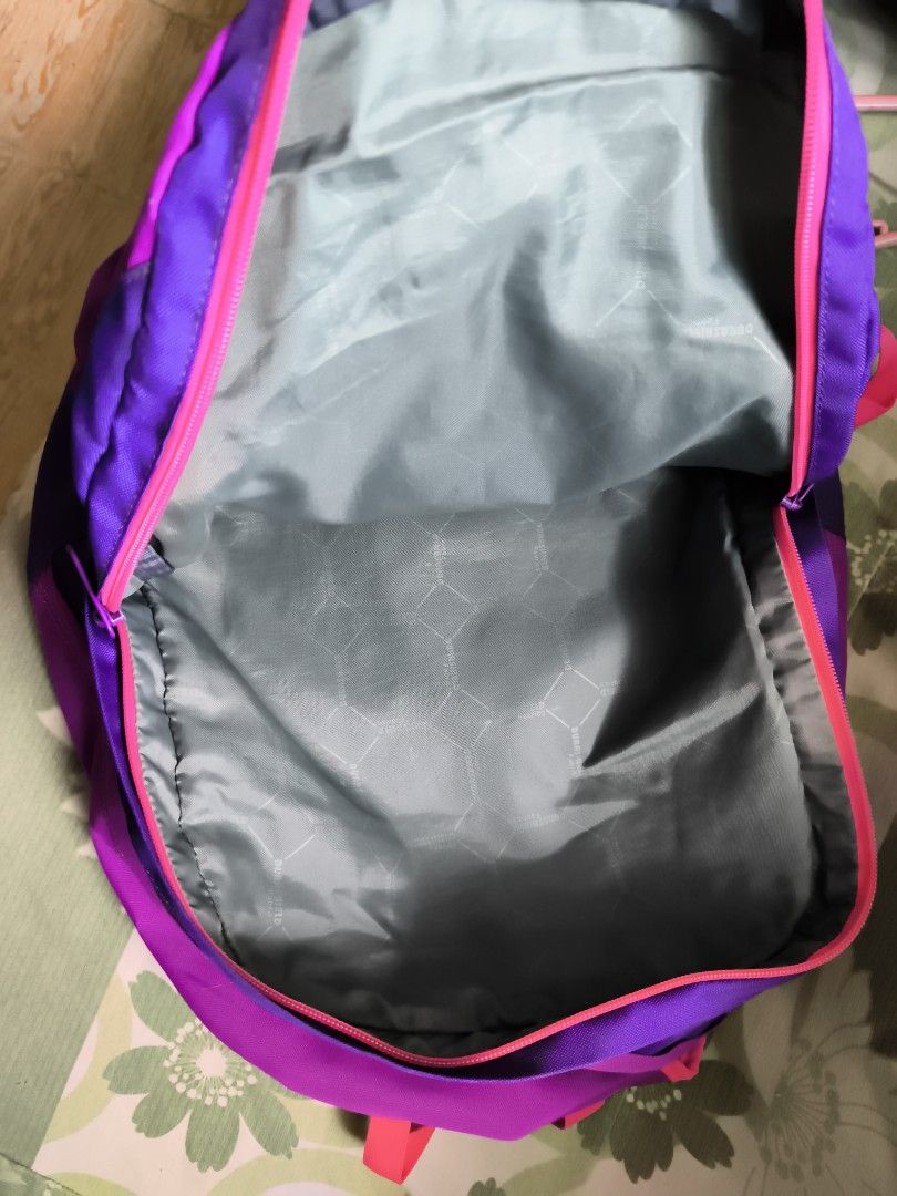 Hawk Purple and Pink School Backpack Bag (Category: Backpacks) located in Bulacan. Submitted by jvblaguard08460 (Listing ID 1470756754, Image 3). Description: - Brand: Hawk - Colorway: Purple and pink - Compartments: Multiple zipped front pockets and a spacious main interior - Interior: Durable patterned lining - Straps: Comfortable, padded pink shoulder straps with sturdy zippers and pull tabs - Condition: Clean inside and out - Ideal Use: Perfe