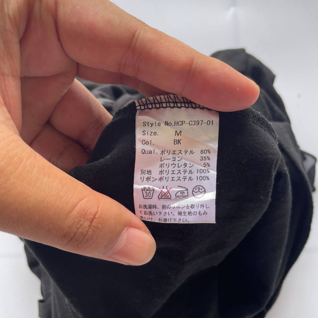 Hellcat Punks Black Corset Front Top Size M (Category: Blouses) located in Panabo. Submitted by moneyfckyaw (Listing ID 1470917278, Image 3). Description: - Brand: Hellcat Punks - Style Number: HCP-C397-01 - Size: M - Color: Black - Details: Front lace-up closure with ribbon ties and metal grommets, scoop neckline, short flared sleeves - Materials: Body is 60% polyester, 35% rayon, 5% polyurethane; Contrast & ribbon are 100% polyester - Origin: M