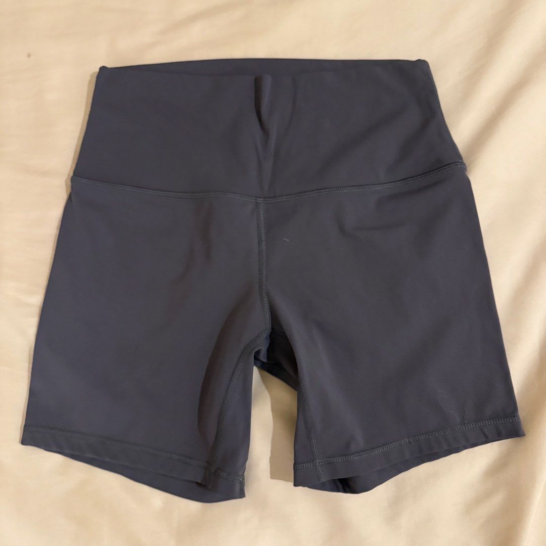 High-waisted athletic biker shorts dark grey (Category: Shorts) located in Quezon City. Submitted by s0l4nge (Listing ID 1470885735, Image 1). Description: - Color: Dark Grey - Fit: High waist - Material: Soft and stretchy fabric - Features: Clean hems, solid stitching - Best for: Workouts, lounging, and everyday wear.