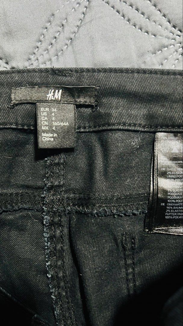 H&M Black Denim Shorts Size US 4 (Category: Shorts) located in Quezon City. Submitted by halfofit (Listing ID 1470747075, Image 2). Description: - Brand: H&M - Size: US 4 / EUR 34 - Color: Black - Material: 98% Cotton, 2% Elastane - Features: Raw hem with frayed edges, button closure, and front pockets - Condition: Great warm-weather staple.