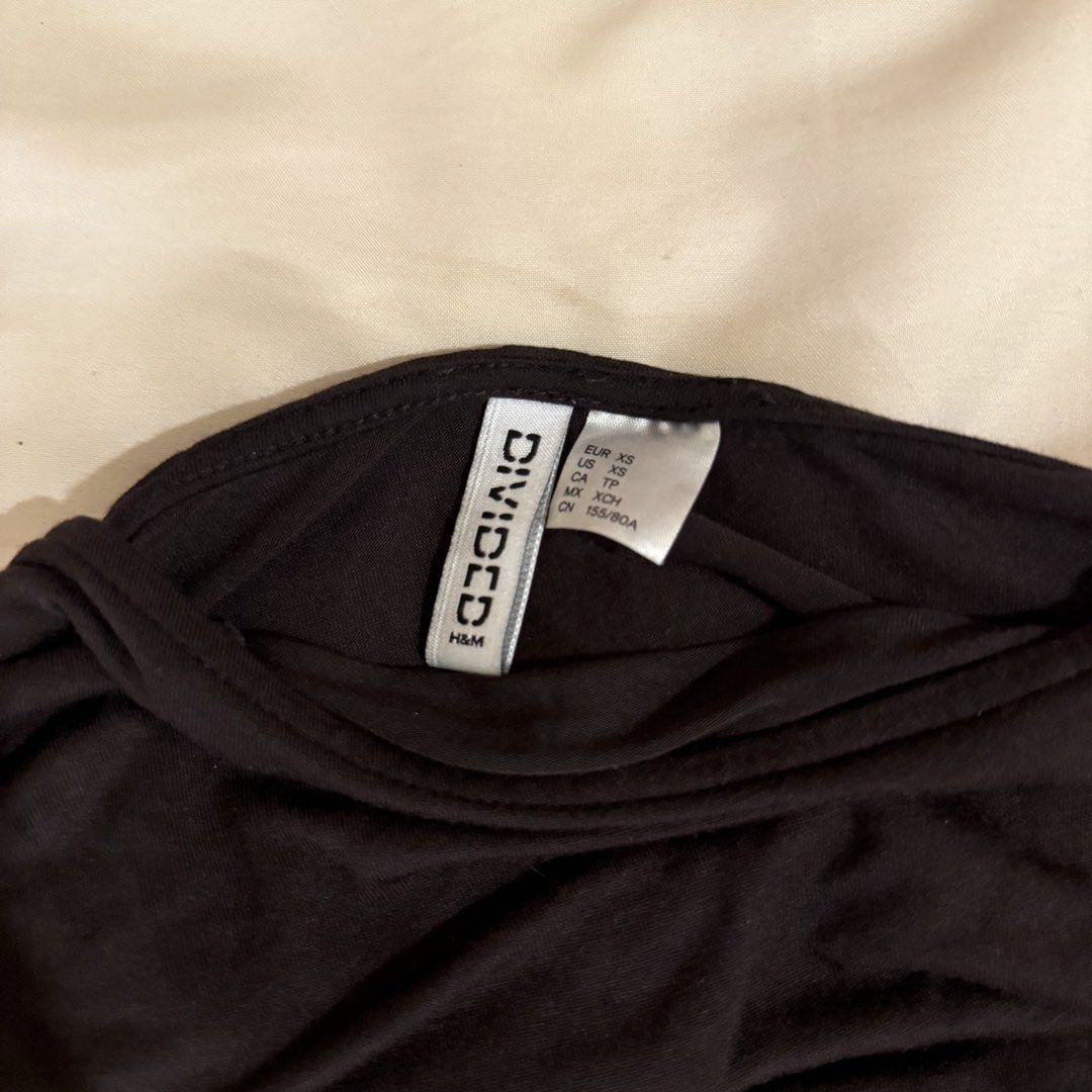 H&M Divided One-Shoulder Asymmetrical Brown Top (Category: Sleeveless) located in Quezon City. Submitted by s0l4nge (Listing ID 1470881791, Image 3). Description: - Brand/Model: H&M - Color: Dark brown - Size: XS - Style: One-shoulder with asymmetrical neckline, draping, and ruched sides - Fit: Super flattering with stretchy fabric - Condition: Worn a few times, still in great shape.