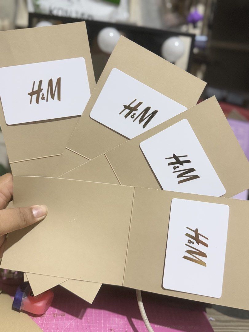 H&M Gift Card 10,000 PHP Value (Category: Vouchers) located in Makati City. Submitted by beautiesandmore (Listing ID 1470789442, Image 1). Description: H&M gift cards- with 10k value each card, I have 4 sets. Validated ang card sa H&M store u can check it also Get 2, bigay ko sa mababang price. Take all for a much lower price. PM me <3 Perfect for Christmas Shopping Details: - Quantity: 4 H&M gift cards available - Value: 10,000 PHP per card (Tot