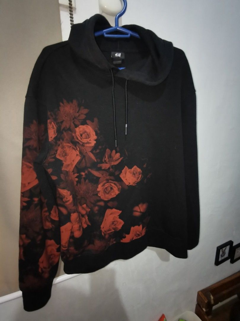 H&M Hoodie (Category: Coats, Jackets and Outerwear) located in Lemery. Submitted by hirayaspaperie (Listing ID 1470781664, Image 1). Description: H&M black hoodie jacket with flower design. Search Google lens for details.. Size indicated on tag..