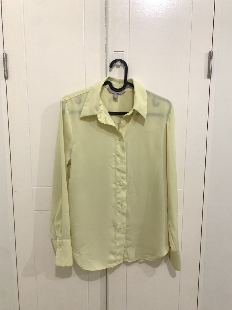 H&M Light Yellow Long Sleeve Button Down Blouse XS (Category: Longsleeves) located in Pasig City. Submitted by lovedbyri (Listing ID 1470861541, Image 1). Description: - Brand: H&M - Size: XS - Color: Light yellow - Style: Long sleeves, button cuffs, collared neckline, back box pleat - Condition: Pre-loved with a few small snags/pulls near the shoulder and back (priced accordingly) - Versatile piece for office or casual wear.