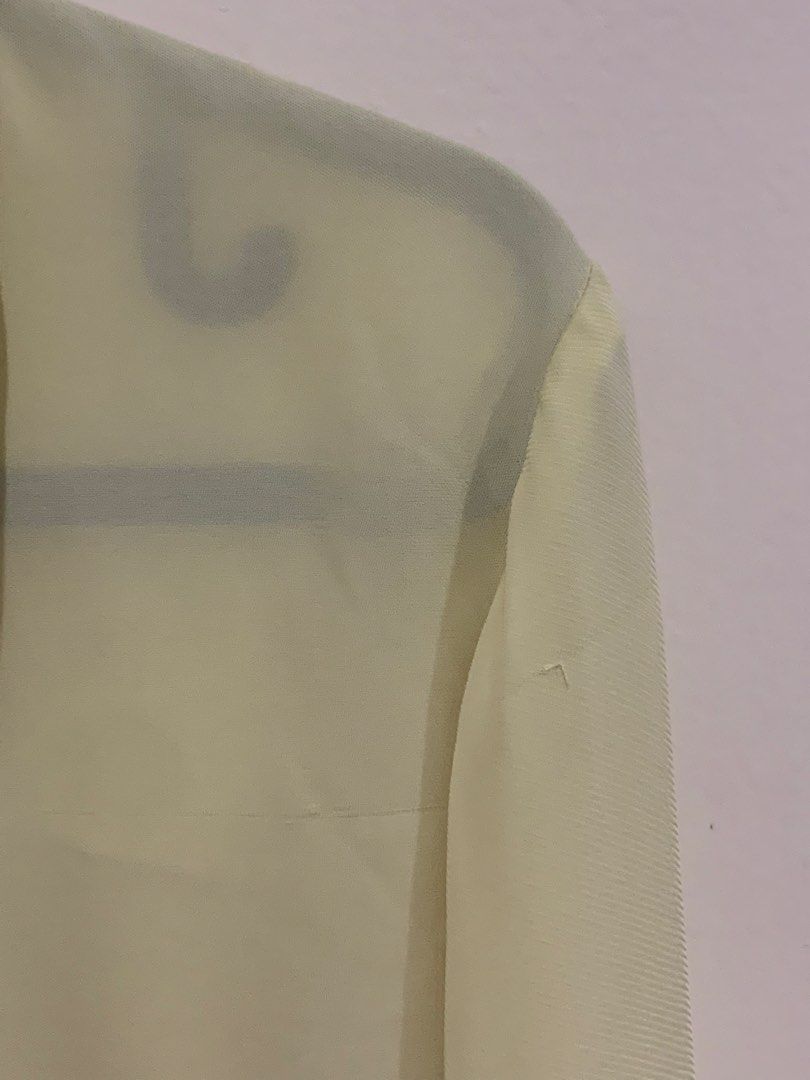 H&M Light Yellow Long Sleeve Button Down Blouse XS (Category: Longsleeves) located in Pasig City. Submitted by lovedbyri (Listing ID 1470861541, Image 2). Description: - Brand: H&M - Size: XS - Color: Light yellow - Style: Long sleeves, button cuffs, collared neckline, back box pleat - Condition: Pre-loved with a few small snags/pulls near the shoulder and back (priced accordingly) - Versatile piece for office or casual wear.