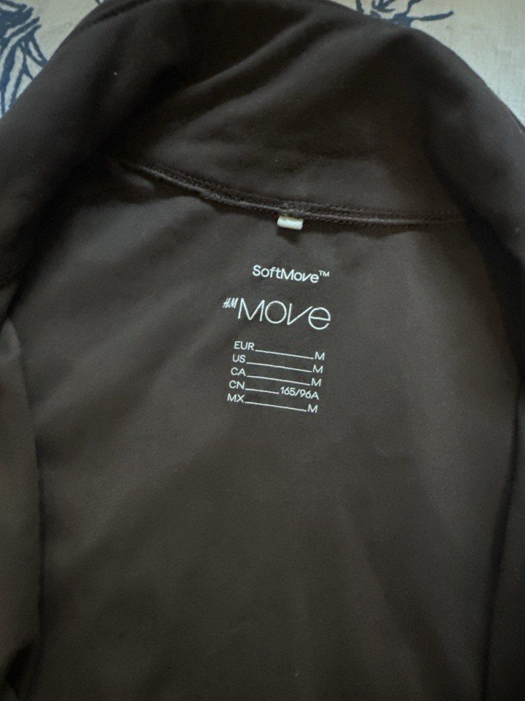 H&M Move Yoga jacket (Category: Activewear) located in Pasig City. Submitted by kaelsy (Listing ID 1470754857, Image 3). Description: Color: choco brown .
