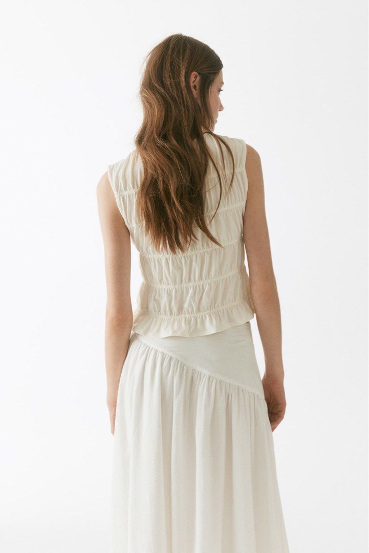 LF: H&M Smocked Jersey top in Cream (Category: Looking For) located in Marikina City. Submitted by jlram (Listing ID 1470880671, Image 2). Description: H&M Smocked Jersey Top.