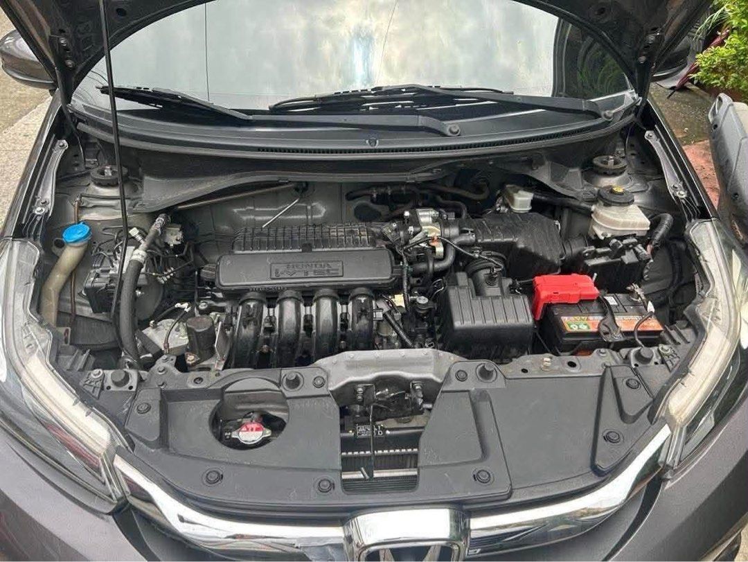 Honda Brio (Category: Used Cars) located in Quezon City. Submitted by ruhermano (Listing ID 1470779593, Image 1). Description: 2021 Honda Brio 1.2 V CVT car Key Specifications: * 📍 Location: Q.C * 🎨 Color: Exterior Color : Modern Steel / Interior Color: Gray-Black * Leather Seat Covers by Lederland * Intact Interior * Touchscreen Infotainment * Dual SRS Airbag * ⛽ Fuel Type: Gas * 📄 Complete papers * Registered until February 2027 * Insurance 