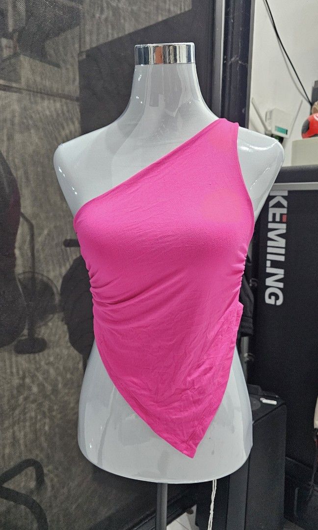 Hot Pink Asymmetrical One-Side Top (Category: Sleeveless) located in Manila. Submitted by dndgnzlz (Listing ID 1470847910, Image 1). Description: Brand: N/A Size: Small Used once Stretchy, light fabric Payment first policy MOP: BPI, Gcash, Maya Courier: LBC, J&T, Lalamove, Grab.