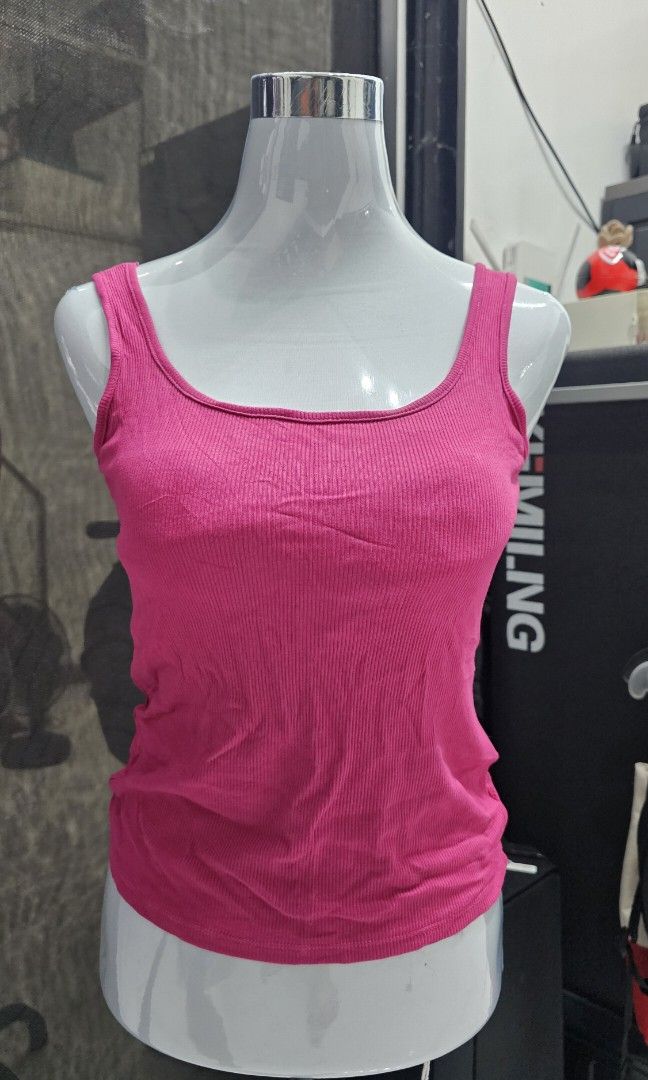 Hot Pink Padded Tank Top (Category: Sleeveless) located in Manila. Submitted by dndgnzlz (Listing ID 1470828941, Image 1). Description: Brand: N/A Worn twice Size: Medium Payment first policy MOP: BPI, Gcash, Maya Courier: LBC, J&T, Lalamove, Grab.