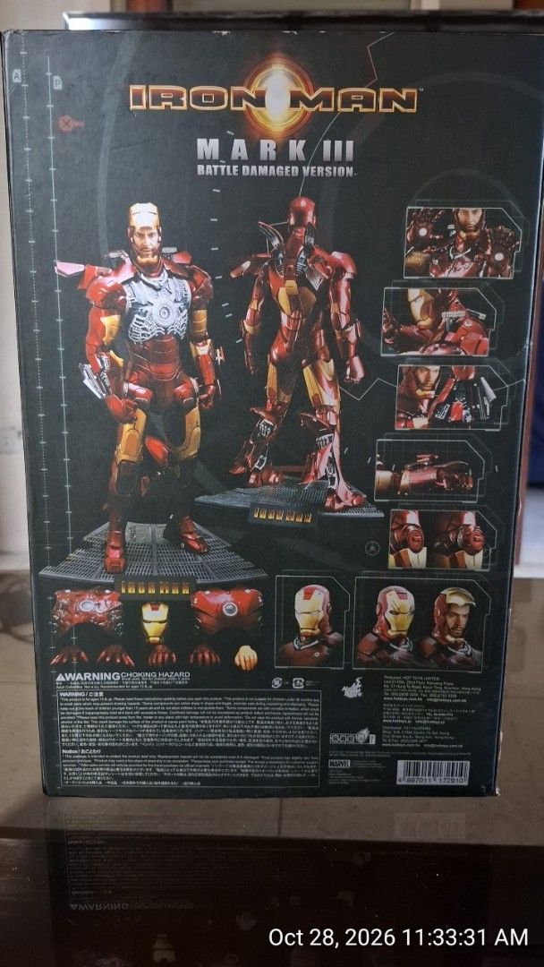 Hot Toys Iron Man Mark III Battle Damaged Version (Category: Figurines & Statues) located in Imus. Submitted by jeffbergs (Listing ID 1470769867, Image 2). Description: - Authentic Hot Toys 1/6 scale Iron Man Mark III Battle Damaged Version - Includes interchangeable chest armor - Features a dedicated display stand - Perfect centerpiece for Marvel and MCU collectors - Condition: Figure is in great shape, box has minor shelf wear from storage - Pl