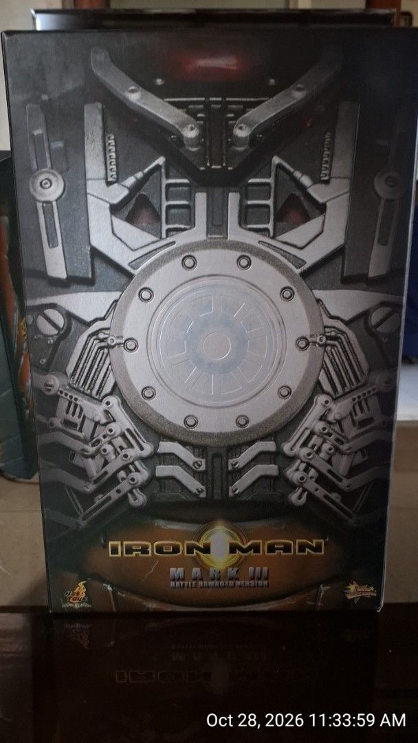 Hot Toys Iron Man Mark III Battle Damaged Version (Category: Figurines & Statues) located in Imus. Submitted by jeffbergs (Listing ID 1470769867, Image 3). Description: - Authentic Hot Toys 1/6 scale Iron Man Mark III Battle Damaged Version - Includes interchangeable chest armor - Features a dedicated display stand - Perfect centerpiece for Marvel and MCU collectors - Condition: Figure is in great shape, box has minor shelf wear from storage - Pl