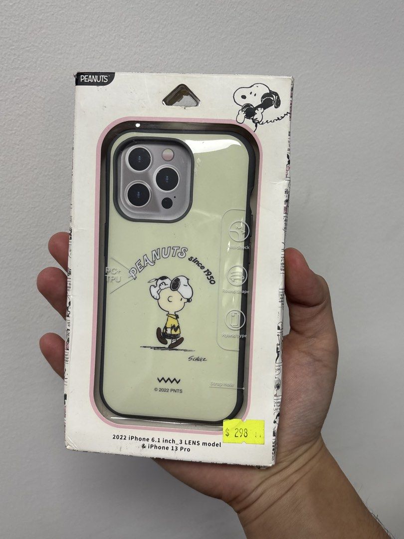 iFit+ by Gourmandise PEANUTS iPhone 14 PRO / 13 PRO Case (Category: Cases & Sleeves) located in Manila. Submitted by tindero_ng_ano (Listing ID 1470845583, Image 1). Description: iFit+ by Gourmandise PEANUTS iPhone 14 PRO / 13 PRO Case -Compatible with: iPhone 14 Pro / iPhone 13 Pro -Features: Anti-shock, hybrid PC + TPU -Condition: Brand new, unused, no issues -₱400.
