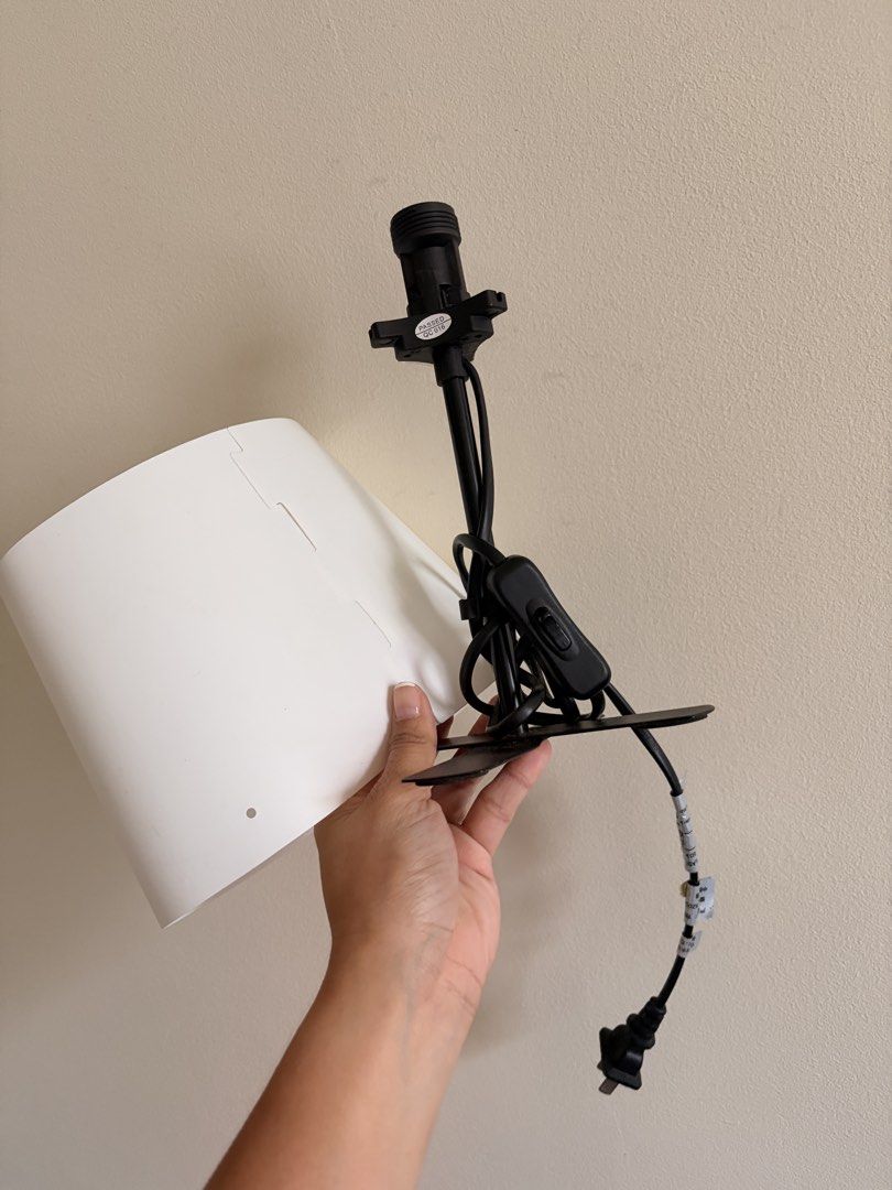 Ikea White Shade Lamp with E14 Socket and Cord (Category: Lighting) located in Taguig. Submitted by wandi08 (Listing ID 1470895997, Image 2). Description: 📌 Lamp from IKEA - GOOD AS NEW - Used only once - Bought around ₱250-₱299 RFS: Bought a floor lamp DETAILS: - Color/Design: Clean white lamp shade with a modern black electrical cord - Hardware: Includes E14 socket holder, inline switch, and standard two-prong plug - Bulb Compatibility: Suppor