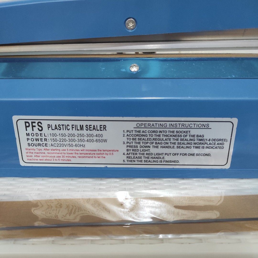 Impulse Sealer 300mm Plastic Bag Sealing Machine (Category: Craft Supplies & Tools) located in Quezon City. Submitted by thrifterella (Listing ID 1470816443, Image 2). Description: - Model: PFS-300 Impulse Plastic Film Sealer - Ideal for: PP and PE plastic bags - Sealing Length: 300mm - Settings: Adjustable timer knob (levels 1-6) - Power: 220V - Inclusions: Original box, instruction manual, and spare heating element strip - Condition: Easy to op