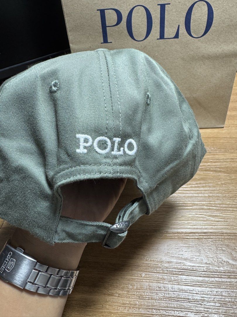 INDONESIA BRAND POLO CAP (Category: Caps & Hats) located in Manila. Submitted by leiiplayys (Listing ID 1470843412, Image 2). Description: - Brand: Polo Ralph Lauren - Color: Olive green with white embroidery - Details: White embroidered pony logo on front, white POLO lettering on back - Hardware: Adjustable strap with POLO-engraved metal buckle - Interior: Navy blue tag with yellow POLO text - Condition: Brand new, unworn, clean fabric with orig