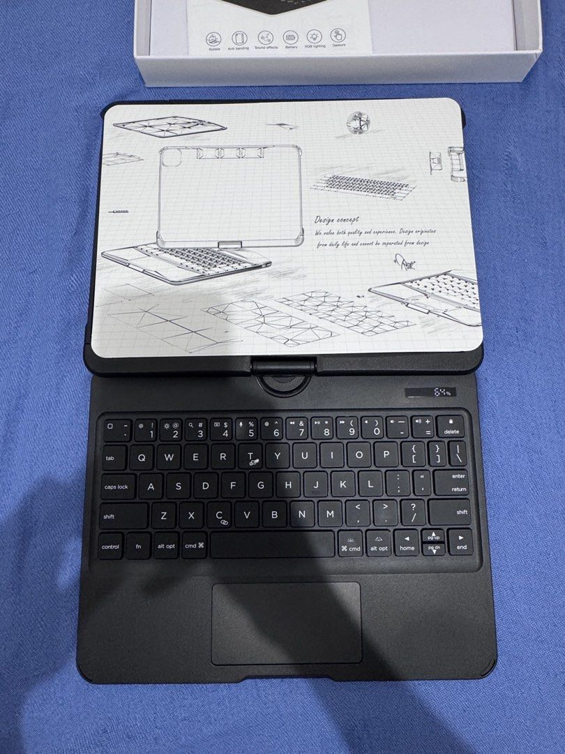 IPAD CASE ROTATING KEYBOARD WITH RGB LIGHTING (Category: Cases & Sleeves) located in Manila. Submitted by kazoo1490 (Listing ID 1470782143, Image 3). Description: TRANSFORM YOUR iPAD INTO A MACBOOK-STYLE SETUP! Compatible with iPad Air 7 (11-inch) / iPad Air 8 (11-inch) Condition: Good as brand new Reason for Selling: No longer using it. Features & Specifications Backlit Keyboard * 7-color backlighting options * Easy to type in dark or dim enviro