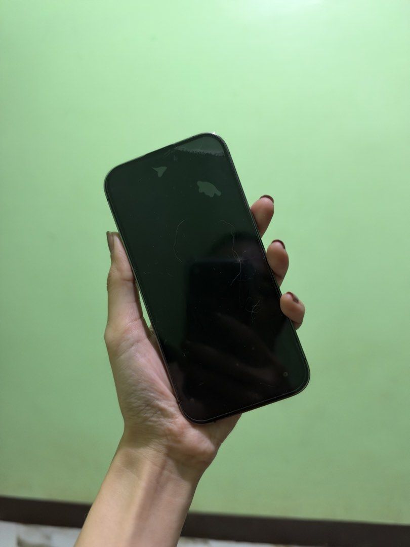 Iphone 14 pro (Category: iPhone 14 Series) located in Quezon City. Submitted by _meffenamic (Listing ID 1470890096, Image 1). Description: Comes with its box and original apple cord Issue: scratch on the lcd. Can be replaced around 5-6k but it doesnt affect the use of the phone. Bought in apple store..