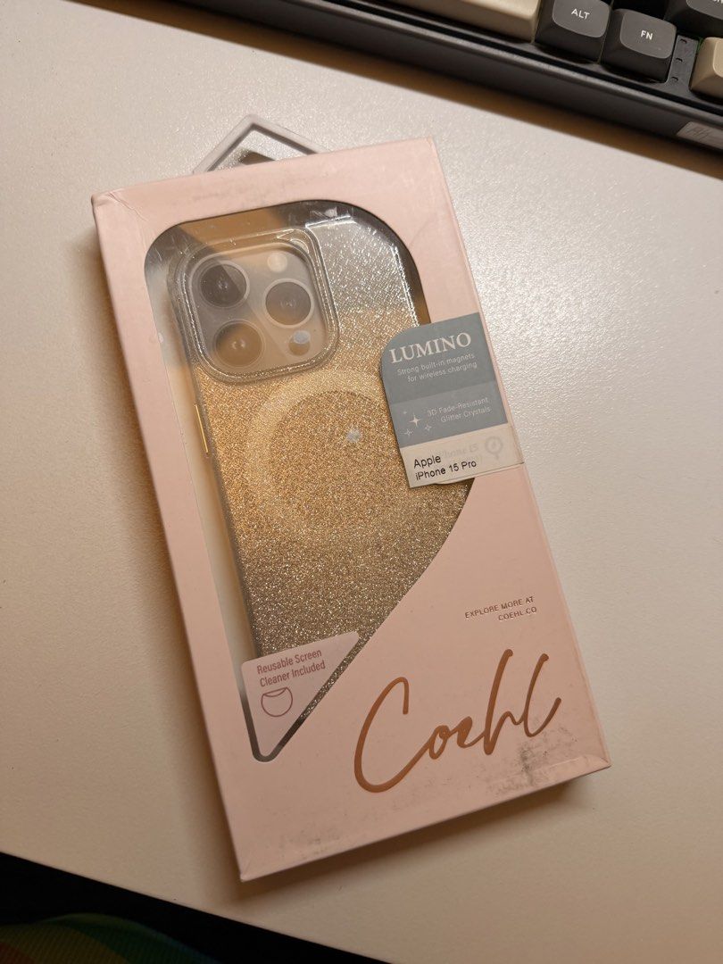 iPhone 15 Pro Case (Category: Cases & Sleeves) located in General Mariano Alvarez. Submitted by nlspnl98 (Listing ID 1470860202, Image 1). Description: Brand New Sealed Coehl Lumino Case for iPhone 15 Pro Selling a brand new, completely sealed and unused Coehl Lumino case for the iPhone 15 Pro. Features: Embedded 3D fade-resistant glitter crystals Built-in magnets for MagSafe and wireless charging compatibility Includes a reusable screen cleaner 
