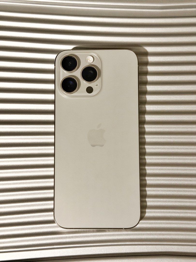 Iphone 15 Pro Max (Category: iPhone 15 Series) located in Pasig City. Submitted by declutter.ryn (Listing ID 1470874405, Image 1). Description: iPhone 15 Pro Max Factory Unlocked / No SIM restrictions - Color: White Titanium - Storage: 256GB - Condition: Excellent condition, No issues and no repair history - Battery Health: 88% (original, still lasts a day) Includes cable and cases. No box Location: Pasig (Meetups available).