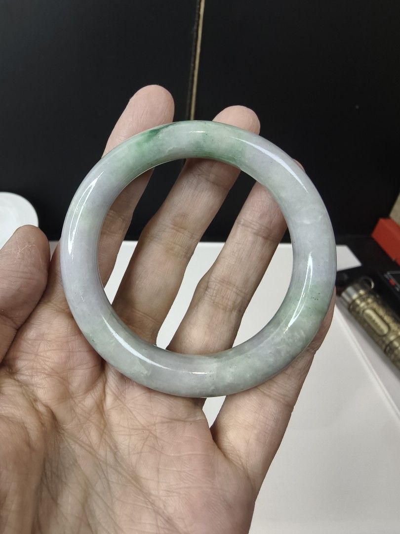Jadeite Bangle (Category: Bracelets) located in Kuala Lumpur. Submitted by re_born (Listing ID 1470747307, Image 2). Description: Burmese Grade A Jadeite Bangle - Chun cai -Donut -51.6 x 10.6 x 10.3 -Suitable for 51,52,53 -HSR260858266 *Natural jadeite jade inherently contains inclusions such as cotton-like flaws, grain lines, icy streaks, color lines, and more.