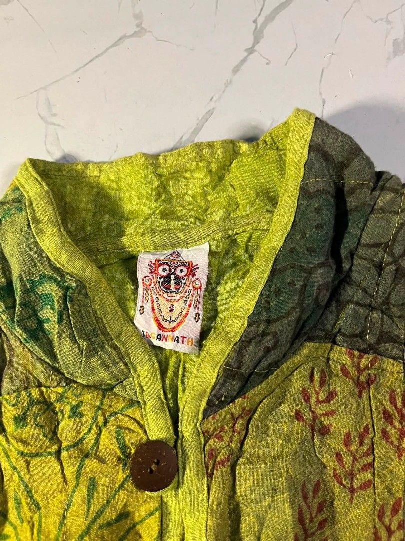 JAGANNATH (Category: Coats, Jackets and Outerwear) located in Zamboanga. Submitted by abubazir7 (Listing ID 1470896714, Image 3). Description: vintage cotton quilted patchwork jacket from the ethnic clothing line Jagannath. Features a mandarin/stand collar, button-down front with wood-style buttons, and two prominent front patch pockets. Dimes L27 W23 Sleeve 23 Issue: Missing one wood buttons 800 php add Shipping fee.