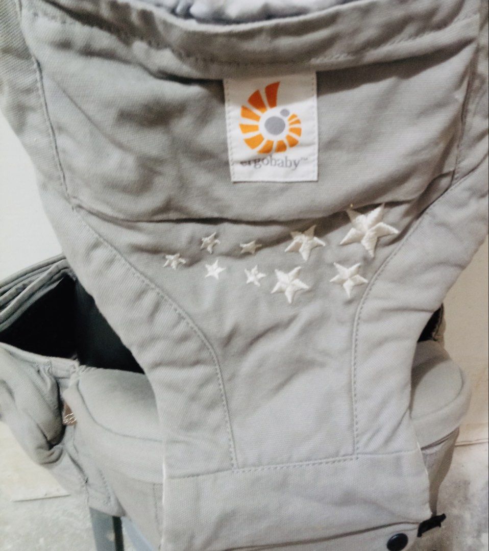 Japan Authentic (Category: Dresses) located in Quezon City. Submitted by charitoo369 (Listing ID 1470754612, Image 3). Description: legacy Ergobaby Original 3-Position Baby Carrier (Galaxy Grey), famous for its neutral gray cotton fabric adorned with embroidered white star clusters. Because the Original line is a discontinued/legacy model. From Japan authentic .