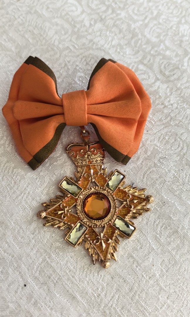 Japan orange brooch bow (Category: Brooches) located in Tuguegarao City. Submitted by zenphoenix-7ad615 (Listing ID 1470780327, Image 2). Description: Japan bow brooch orange color.