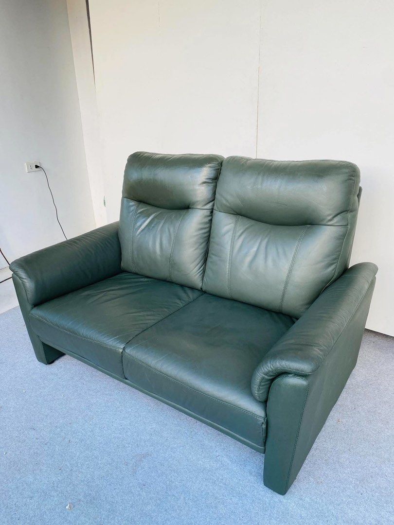 “JAPAN SURPLUS” 2-SEATER HIGHBACK DARK GREEN LEATHER SOFA (Category: Sofas) located in Bulacan. Submitted by monmon555 (Listing ID 1470916763, Image 3). Description: “JAPAN SURPLUS” 2-SEATER HIGHBACK DARK GREEN LEATHER SOFA SIZE: 56L” x 36W” x 16Sh” x 37H” inches (AS-IS ITEM) IN GOOD CONDITION.