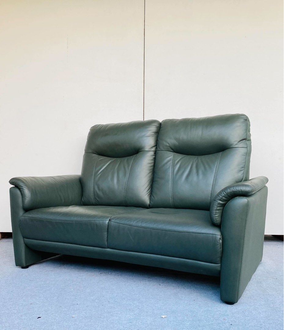 “JAPAN SURPLUS” 2-SEATER HIGHBACK DARK GREEN LEATHER SOFA (Category: Sofas) located in Bulacan. Submitted by monmon555 (Listing ID 1470916763, Image 2). Description: “JAPAN SURPLUS” 2-SEATER HIGHBACK DARK GREEN LEATHER SOFA SIZE: 56L” x 36W” x 16Sh” x 37H” inches (AS-IS ITEM) IN GOOD CONDITION.