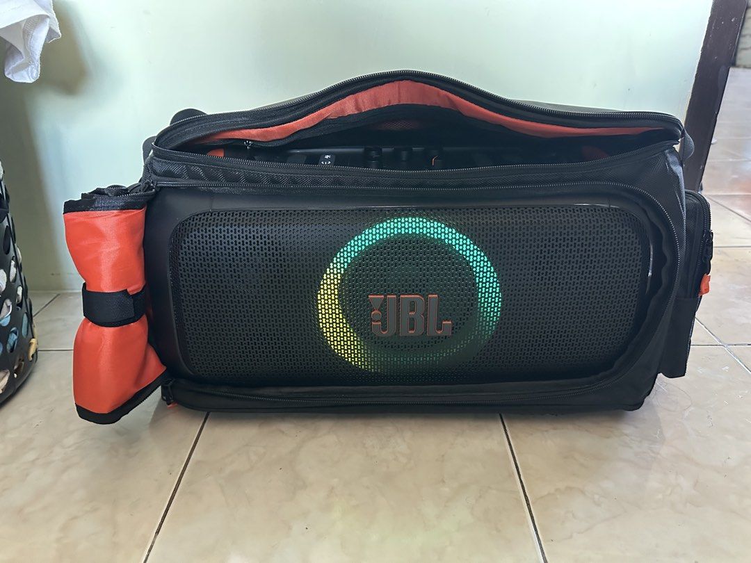 JBL OTG Essential Portable Bluetooth Speaker with Carry Bag (Category: Soundbars, Speakers & Amplifiers) located in Quezon City. Submitted by pxlshop (Listing ID 1470762785, Image 1). Description: JBL OTG WITH MIC AND TRAVEL BAG Ilang beses lang nagamit. Almost Brandnew no issue no scratches or dents (di nga nagamit😂) Complete with box, manuals, charging chord , straps FREE TRAVEL BAG included (madaming compartments with mic storage sa likod) Bo