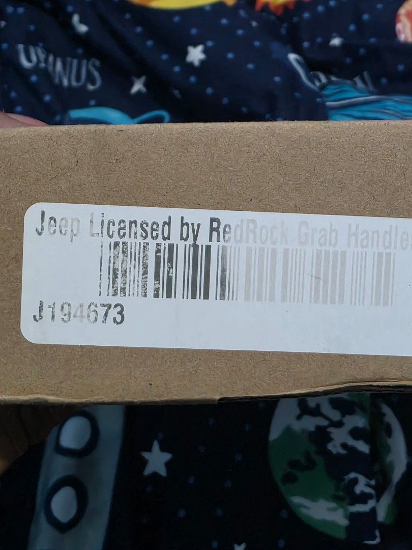 Jeep Licensed Roll Bar Grab Handles (Category: Body Parts and Accessories) located in Manila. Submitted by mjaraneta123 (Listing ID 1470746353, Image 2). Description: - Official Jeep licensed merchandise in original box - Includes one pair of heavy-duty grab handles front - Built with durable black nylon straps and comfortable molded rubber grips - Compatible with Jeep Wrangler TJ (1997-2006), Wrangler JK (2007-2018), and Gladiator JT (2020-2024)