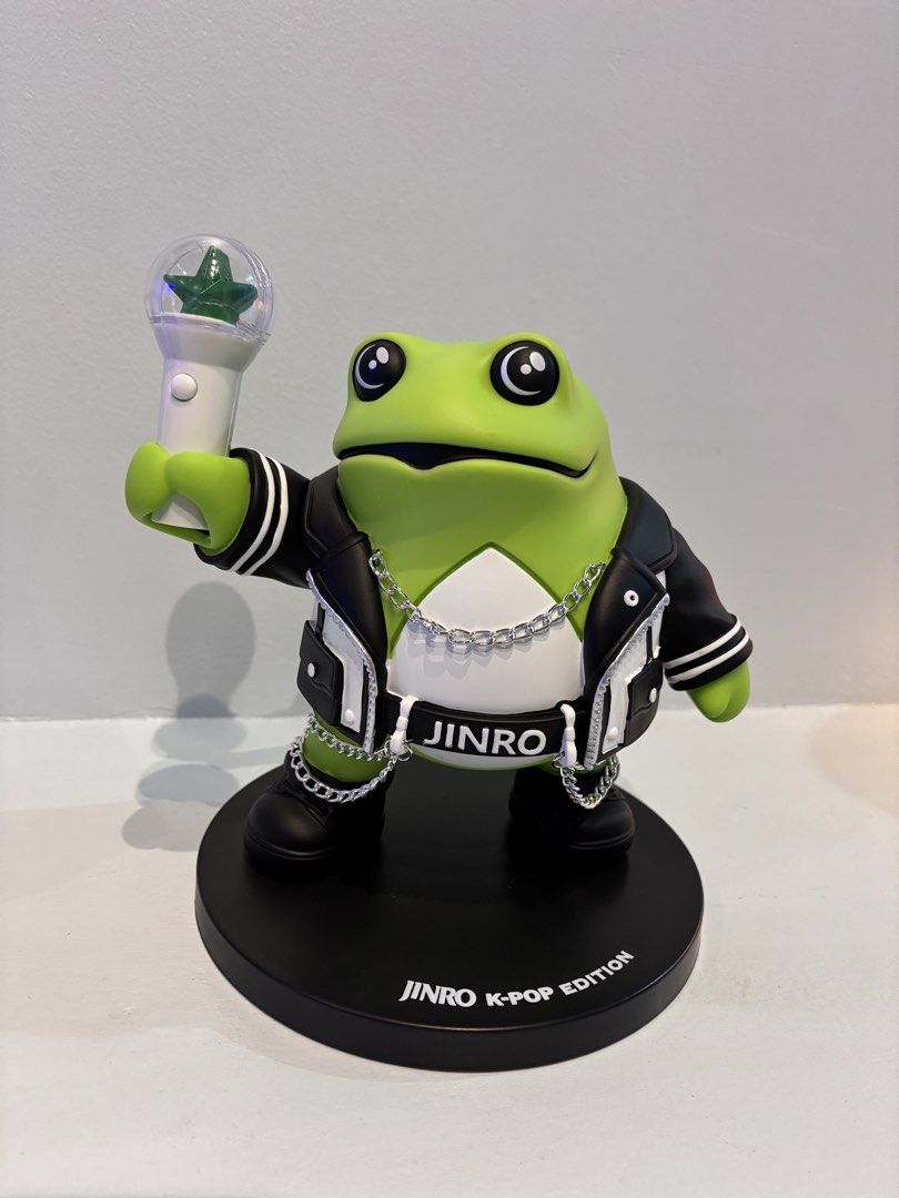 Jinro K-Pop Star Toad Limited Edition Figure (Category: Figurines & Statues) located in Paranaque City. Submitted by jujudeclutterss (Listing ID 1470824438, Image 2). Description: - Authentic Jinro K-Pop Star Toad limited edition collectible figure - Features the iconic green frog in a black and white rocker jacket with chain accessories and a lightstick - Mounted on an official 'Jinro K-Pop Edition' branded base - Includes original box with ligh