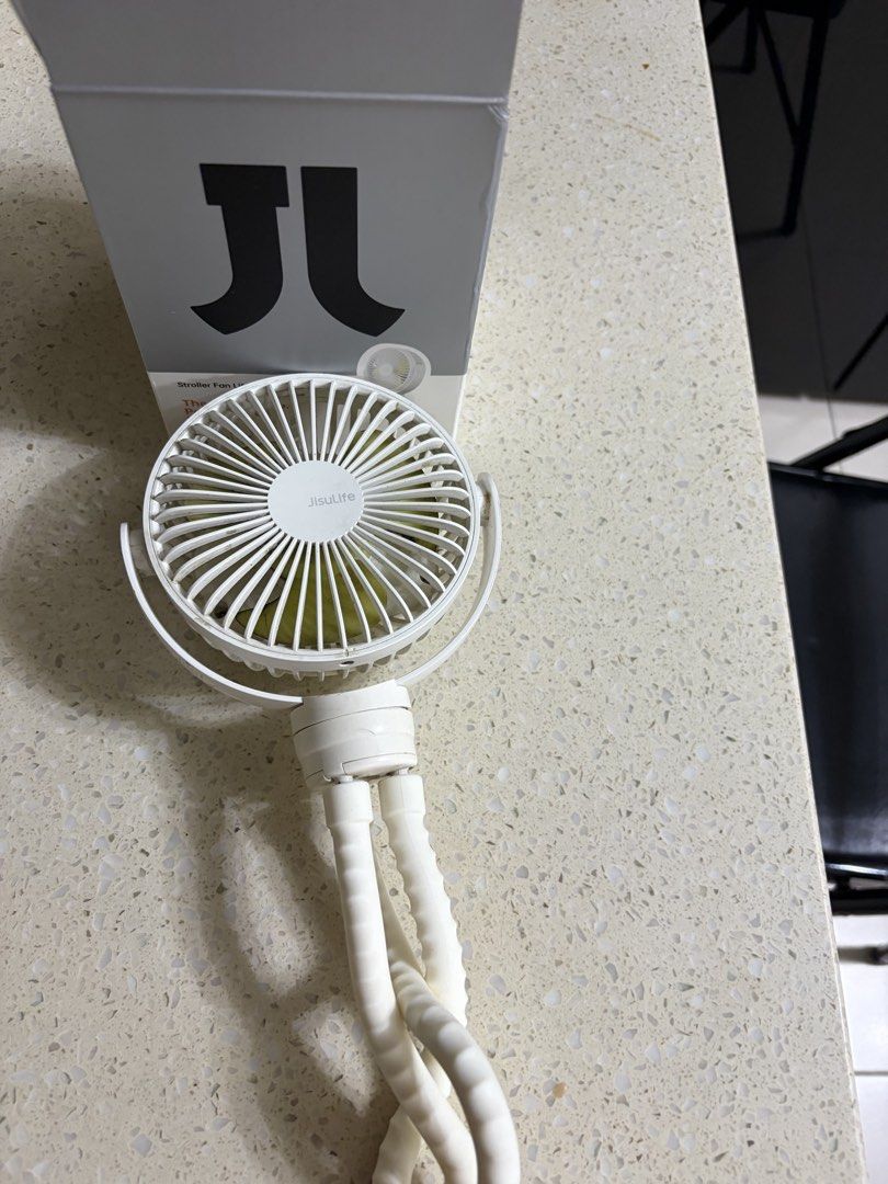Jisulife octopus stroller fan (Category: Other Babies Going Out Needs) located in Manila. Submitted by chandleria (Listing ID 1470825086, Image 2). Description: used few times need cleaning in excellent working condition.