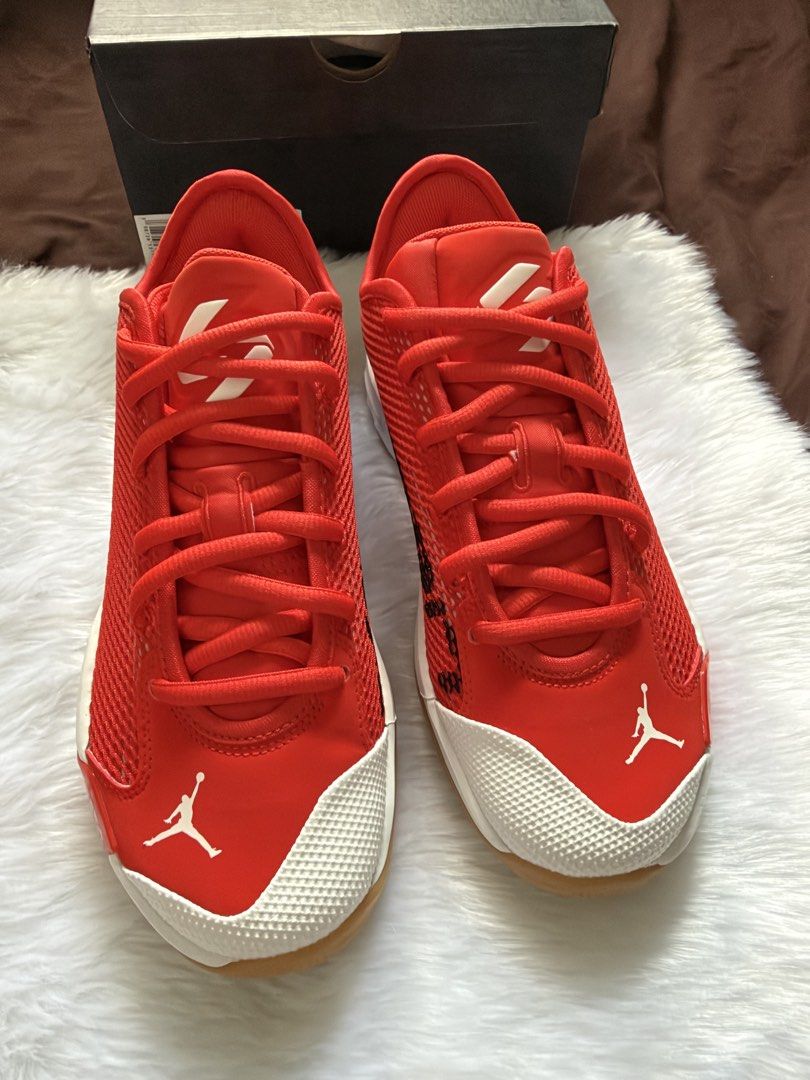 Jordan Luka 77 PF Chile Red White (Category: Sneakers) located in Paranaque City. Submitted by ulscxz18 (Listing ID 1470828539, Image 1). Description: - Model: Jordan Luka 77 PF - Colorway: Chile Red and White - Size: Men's US 8 / Women's US 9.5 - Design: Bright red mesh upper with white toe cap and iconic Jumpman logo - Traction: Durable gum rubber outsole - Inclusion: Original black shoebox included - Condition: 100% authentic, ready to ship or