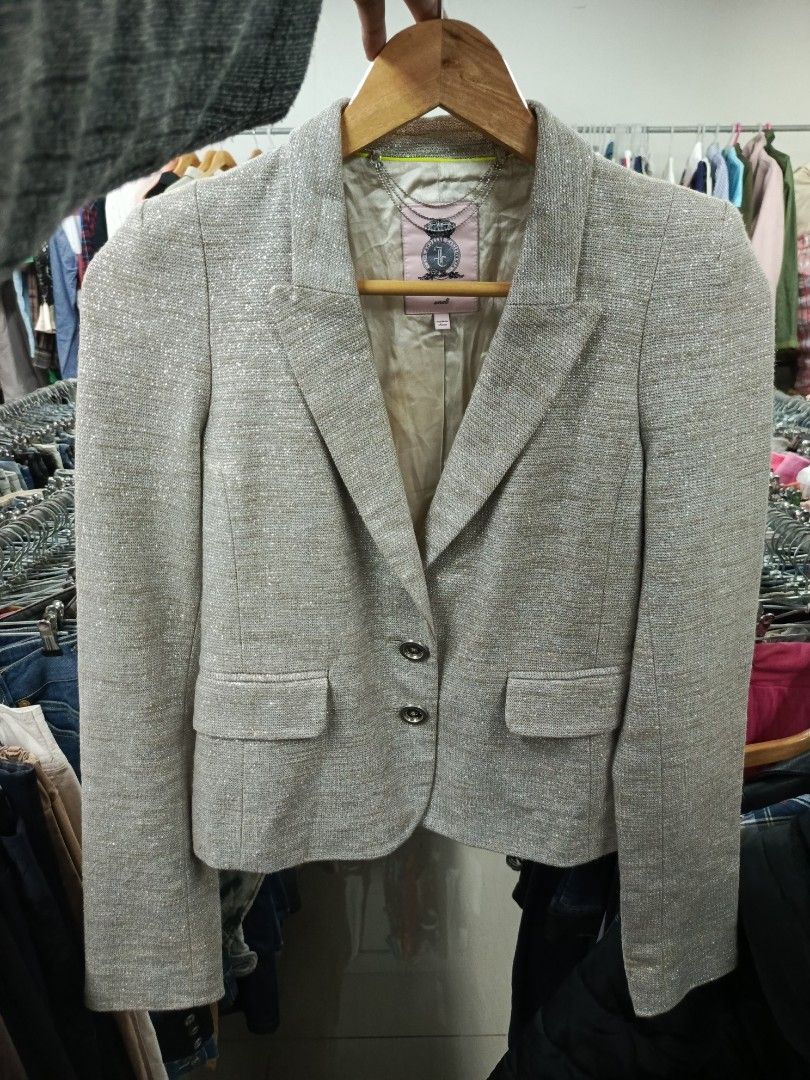 Juicy Couture Metallic Sparkle Blazer Jacket Size S (Category: Coats, Jackets and Outerwear) located in Cabatuan. Submitted by penthegreat (Listing ID 1470837774, Image 1). Description: AUTHENTIC 🔥🔥🔥 - Brand: Juicy Couture - Size: Small - Color: Gold and silver glitter - Material: Premium Italian fabric with smooth silky lining - Design: Structured shoulders, two front buttons, flapped pockets, and classic tailored fit - Special Features: Vibr