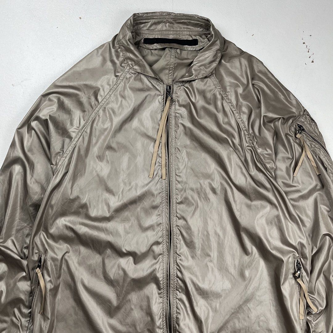 Julius x IT Taffeta MA-1 Bomber Jacket (Category: Coats, Jackets and Outerwear) located in Quezon City. Submitted by forgarments (Listing ID 1470850800, Image 2). Description: Julius x IT Taffeta MA-1 Bomber Jacket Excellent Condition - Minor Abrasion & Stains (see the photo for more details) Size: 3 Chest width: 23 Inches Length: 30 Inches Hem: 21.5 Inches - Taffeta weave - MA-Bomber silhouette - Left sleeve Utility Pocket - 2 hand zippered pock