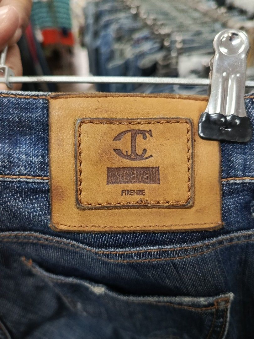 Just Cavalli Firenze Denim Jeans Blue (Category: Jeans) located in Cabatuan. Submitted by penthegreat (Listing ID 1470827083, Image 3). Description: - Brand: Just Cavalli Firenze - Color/Wash: Dark blue wash - Fit: Classic straight leg - Design: Classic five-pocket style with contrast stitching - Details: Branded leather patch on back waistband and engraved metal hardware - Closure: YKK zip fly with branded button - Condition: Great designer piec
